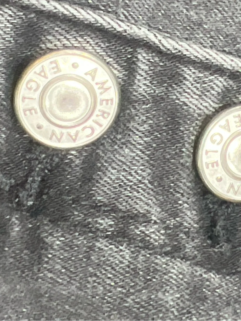 American Eagle Outfitters black denim shorts with button detail